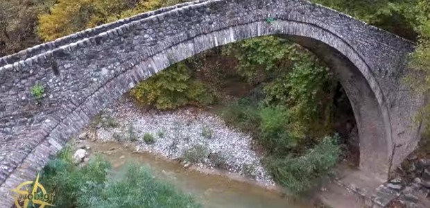 Το πέτρινο τοξωτό γεφύρι του Πορταϊκού ποταμού (Βίντεο)